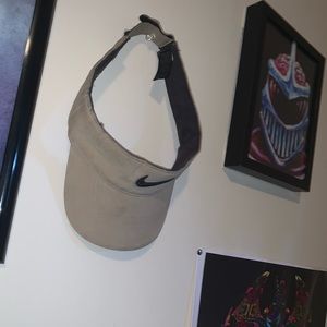 Tan Nike Golf  visor fair condition